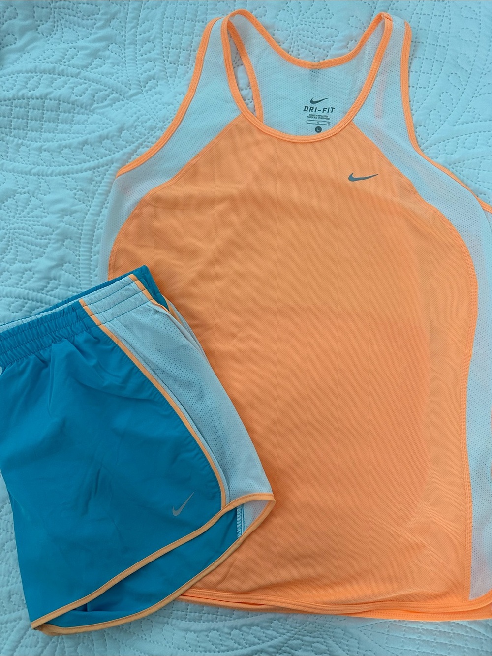 Nike women’s Orange & Blue running Tank and Shorts Set